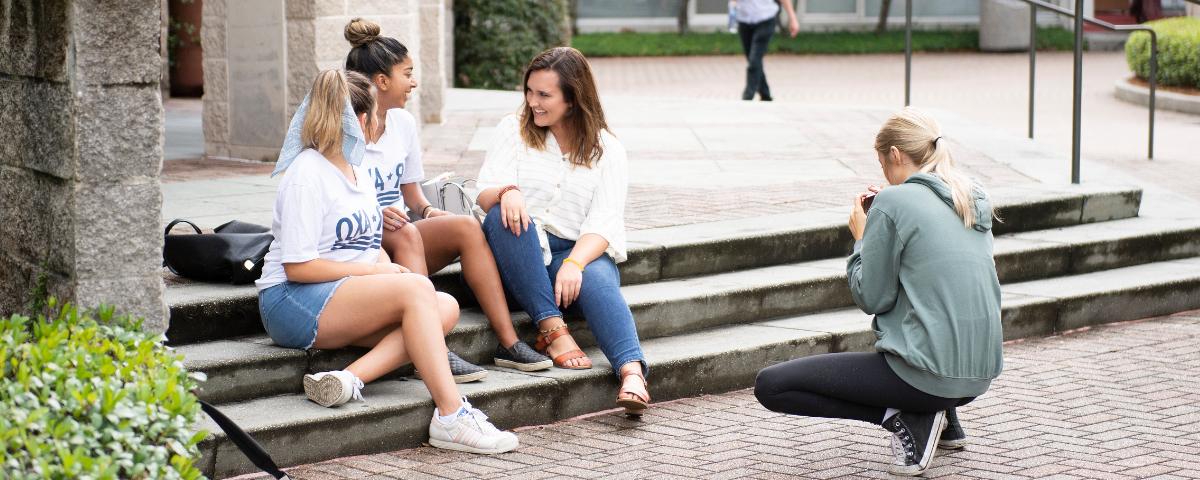 Students on steps of library